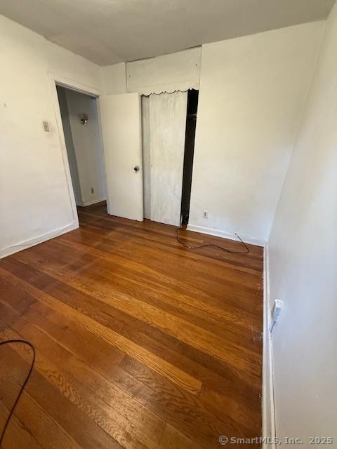 347 Weber St Unit 21Building 97, Stratford, CT 06614 - unfurnished bedroom featuring hardwood / wood-style floors