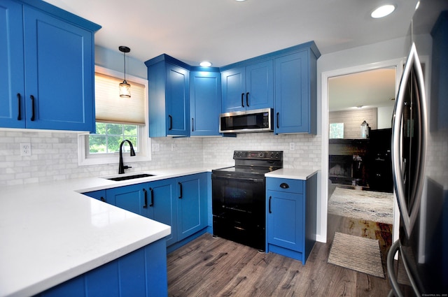 503 Mulberry St, Southington, CT 06479 - kitchen with stainless steel appliances, blue cabinets, dark wood-type flooring, and recessed lighting