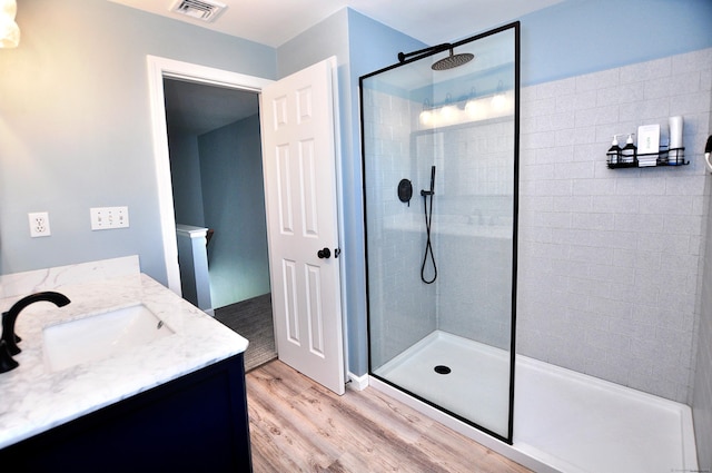 503 Mulberry St, Southington, CT 06479 - full bathroom featuring wood finished floors, a walk in shower, and vanity