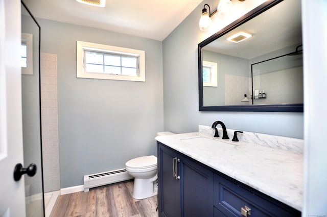 503 Mulberry St, Southington, CT 06479 - full bath featuring a baseboard radiator, vanity, and wood finished floors