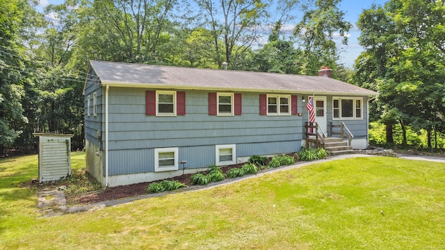 837 Long Cove Rd, Ledyard, CT 06335 - view of front of home featuring a front yard, a chimney, and roof with shingles