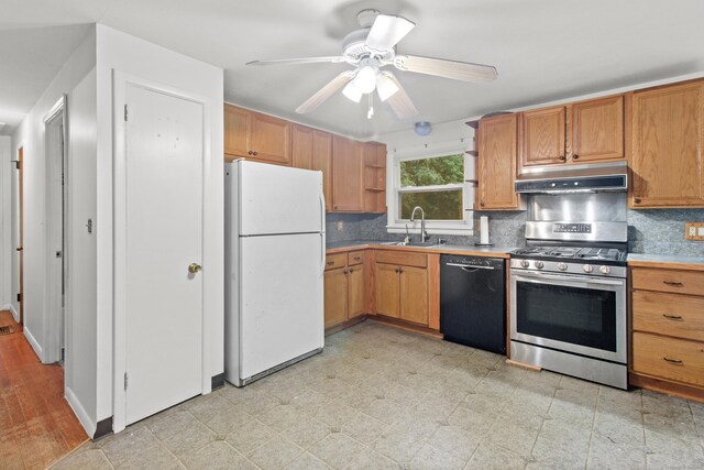 837 Long Cove Rd, Ledyard, CT 06335 - kitchen with dishwasher, freestanding refrigerator, under cabinet range hood, gas range, and open shelves