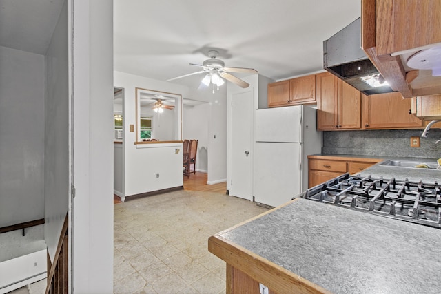 837 Long Cove Rd, Ledyard, CT 06335 - kitchen featuring freestanding refrigerator, light flooring, ceiling fan, ventilation hood, and tasteful backsplash