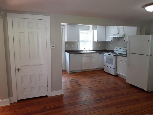 67 Hanover Rd, Newtown, CT 06470 - kitchen featuring white appliances, dark countertops, under cabinet range hood, white cabinetry, and dark wood-type flooring