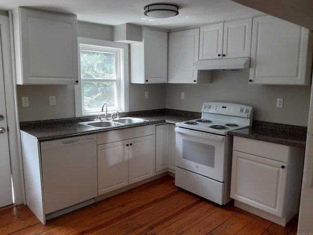 67 Hanover Rd, Newtown, CT 06470 - kitchen with white appliances, under cabinet range hood, and dark countertops