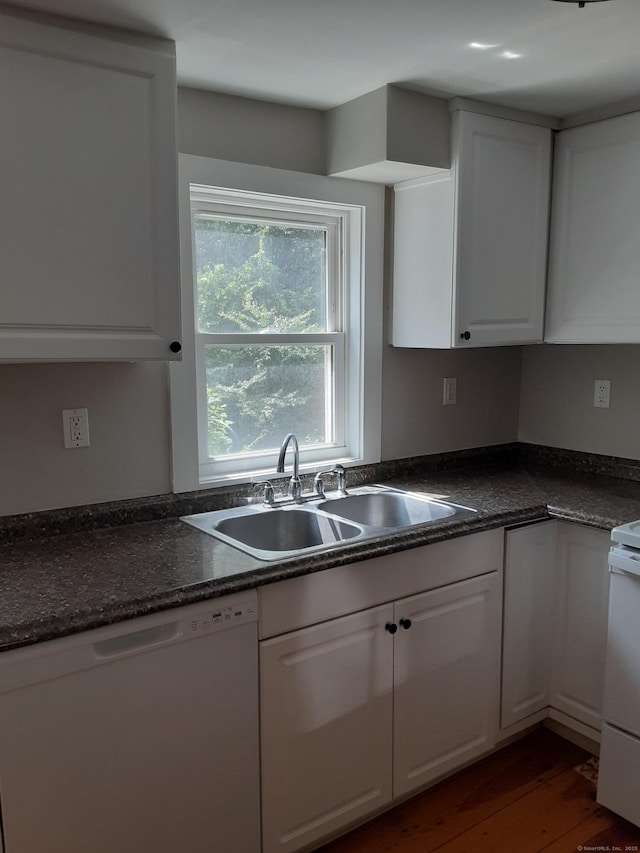 67 Hanover Rd, Newtown, CT 06470 - kitchen featuring white appliances, white cabinetry, dark countertops, and dark wood finished floors