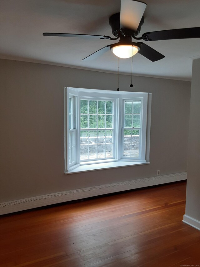 67 Hanover Rd, Newtown, CT 06470 - unfurnished room with wood finished floors and ceiling fan
