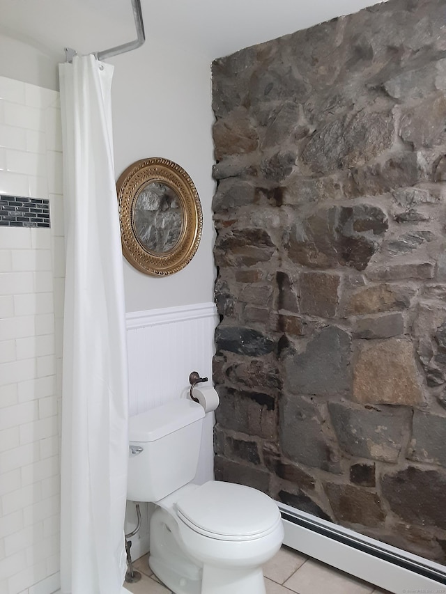 67 Hanover Rd, Newtown, CT 06470 - full bath featuring a baseboard heating unit, wainscoting, tiled shower, and tile patterned floors