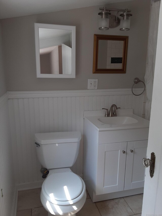 67 Hanover Rd, Newtown, CT 06470 - bathroom with a wainscoted wall and vanity