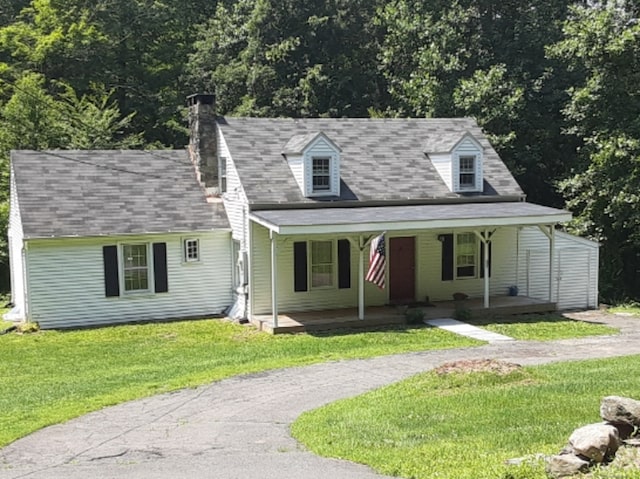 67 Hanover Rd, Newtown, CT 06470 - new england style home featuring a front yard, a chimney, and a porch