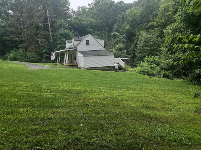 67 Hanover Rd, Newtown, CT 06470 - view of green lawn featuring a view of trees