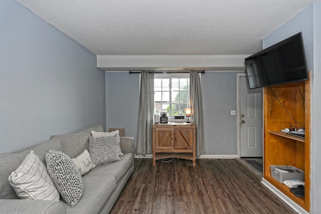 330 Short Beach Rd Apt G13, East Haven, CT 06512 - living area with dark wood-style flooring and a textured ceiling