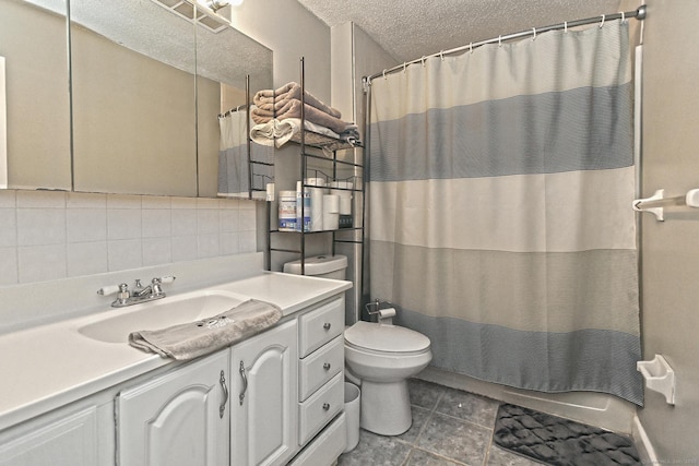330 Short Beach Rd Apt G13, East Haven, CT 06512 - bathroom featuring vanity, tasteful backsplash, a textured ceiling, and tile patterned floors