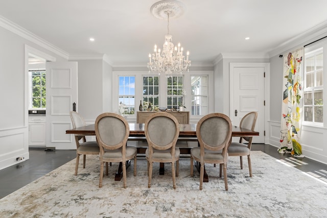 336 Ocean Dr W, Stamford, CT 06902 - dining area with a chandelier, crown molding, a decorative wall, recessed lighting, and dark wood-type flooring