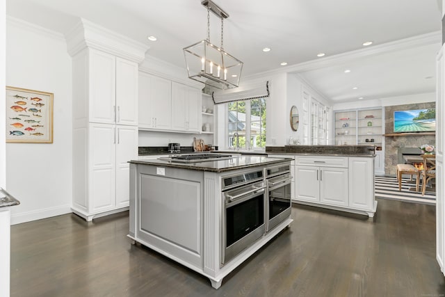 336 Ocean Dr W, Stamford, CT 06902 - kitchen featuring a kitchen island, dark wood-style floors, oven, white cabinetry, and open shelves