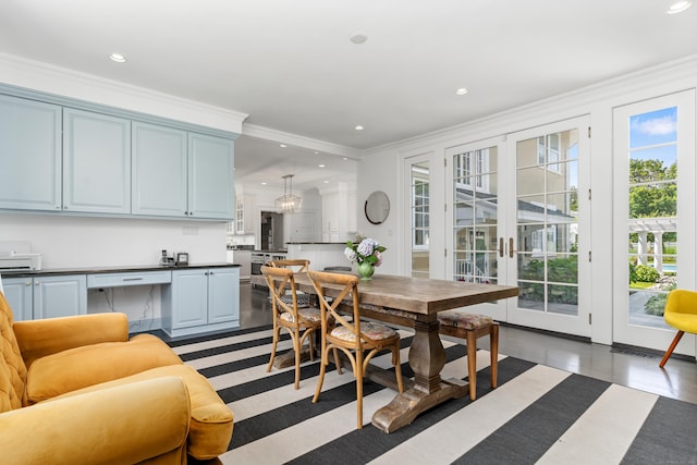 336 Ocean Dr W, Stamford, CT 06902 - dining space featuring french doors, crown molding, recessed lighting, and wood finished floors
