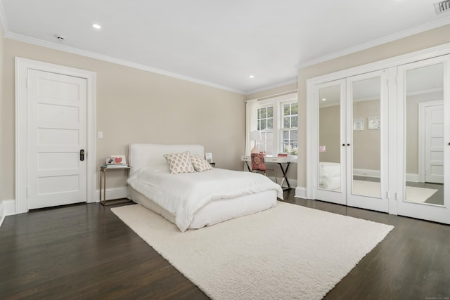 336 Ocean Dr W, Stamford, CT 06902 - bedroom with dark wood finished floors, recessed lighting, french doors, and crown molding