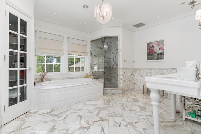 336 Ocean Dr W, Stamford, CT 06902 - bathroom featuring a bath, a marble finish shower, tile walls, crown molding, and a wainscoted wall
