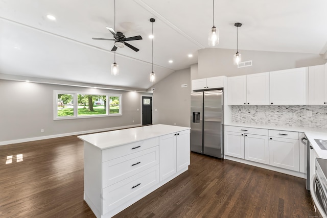 33 Williams Rd, Monroe, CT 06468 - kitchen with stainless steel appliances, vaulted ceiling, ceiling fan, tasteful backsplash, and dark wood-style floors