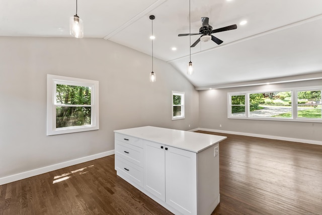 33 Williams Rd, Monroe, CT 06468 - kitchen with vaulted ceiling, open floor plan, dark wood-style floors, pendant lighting, and white cabinets