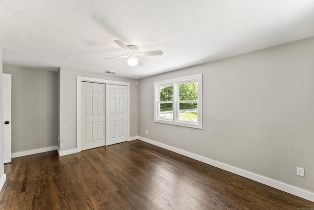 33 Williams Rd, Monroe, CT 06468 - unfurnished bedroom with a closet, dark wood-style flooring, and a ceiling fan