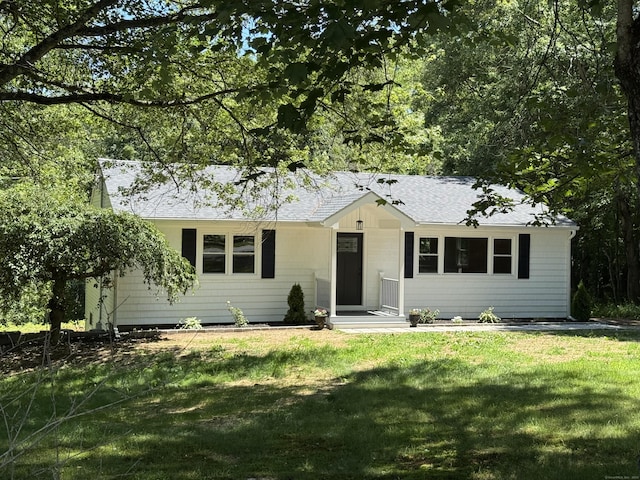 33 Williams Rd, Monroe, CT 06468 - ranch-style house featuring a front lawn and a shingled roof
