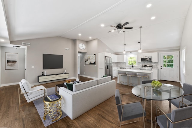 33 Williams Rd, Monroe, CT 06468 - living area with vaulted ceiling, a ceiling fan, dark wood-style floors, and recessed lighting