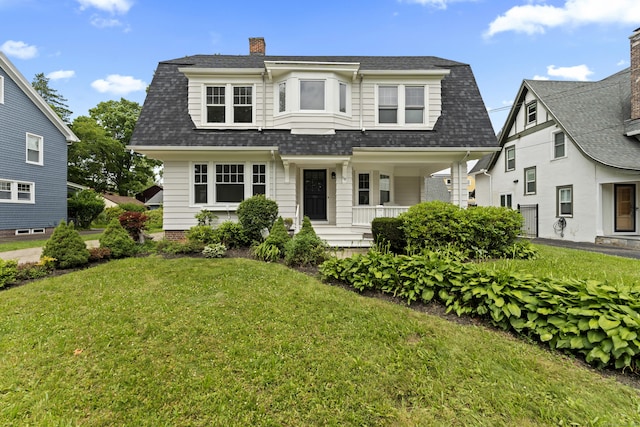 119 Westwood Rd, New Haven, CT 06515 - view of front of house featuring a front yard, roof with shingles, a porch, and a chimney