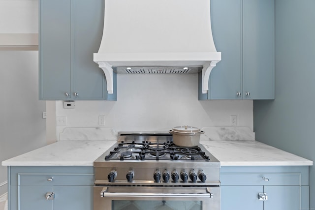 119 Westwood Rd, New Haven, CT 06515 - kitchen with stainless steel stove, custom exhaust hood, and light stone counters