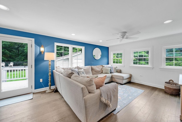 268 Hattertown Rd, Monroe, CT 06468 - living area with healthy amount of natural light, ceiling fan, wood finished floors, crown molding, and recessed lighting