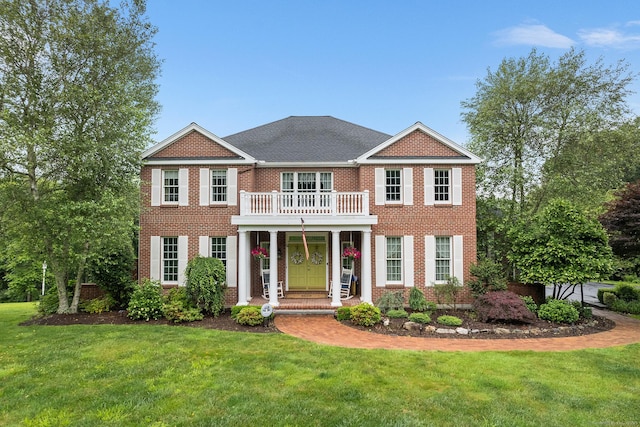 35 Lake Ridge Rd, Southbury, CT 06488 - colonial inspired home featuring a balcony, brick siding, and a front yard