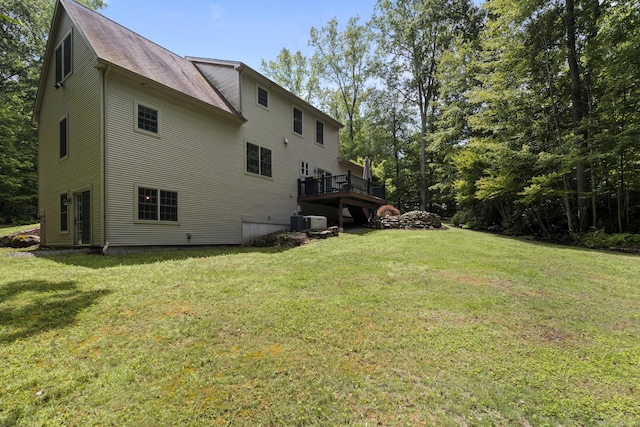 28 Hoop Pole Hill Rd, Chester, CT 06412 - back of property with a lawn, a deck, and roof with shingles