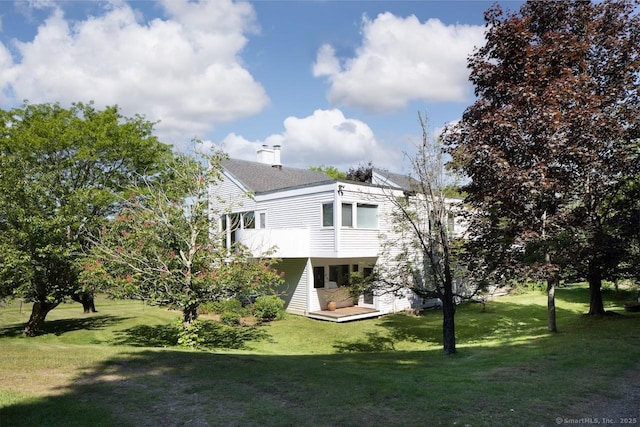 52 Cooper Hill Rd, Salisbury, CT 06068 - rear view of house featuring a lawn, a deck, and roof with shingles