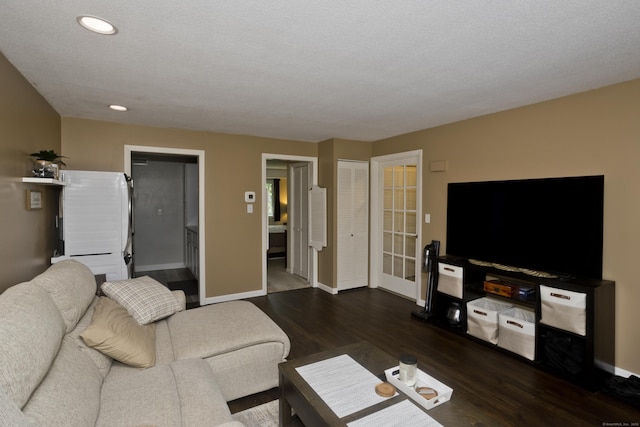 73 Landing Cir Unit 73, Suffield, CT 06078 - living room featuring dark wood-style floors and recessed lighting