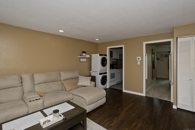 73 Landing Cir Unit 73, Suffield, CT 06078 - living area featuring stacked washer / drying machine, dark wood-style floors, and recessed lighting