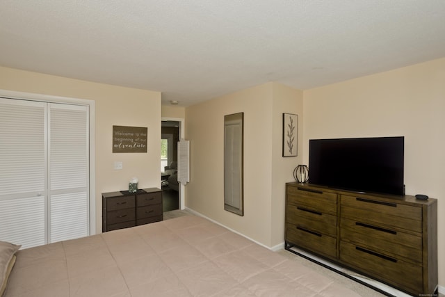 73 Landing Cir Unit 73, Suffield, CT 06078 - bedroom featuring light colored carpet and a closet