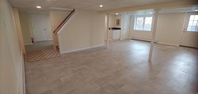 92 Sumac St, West Haven, CT 06516 - basement featuring a baseboard heating unit, a drop ceiling, and stairway