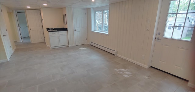 92 Sumac St, West Haven, CT 06516 - doorway with baseboard heating and baseboards