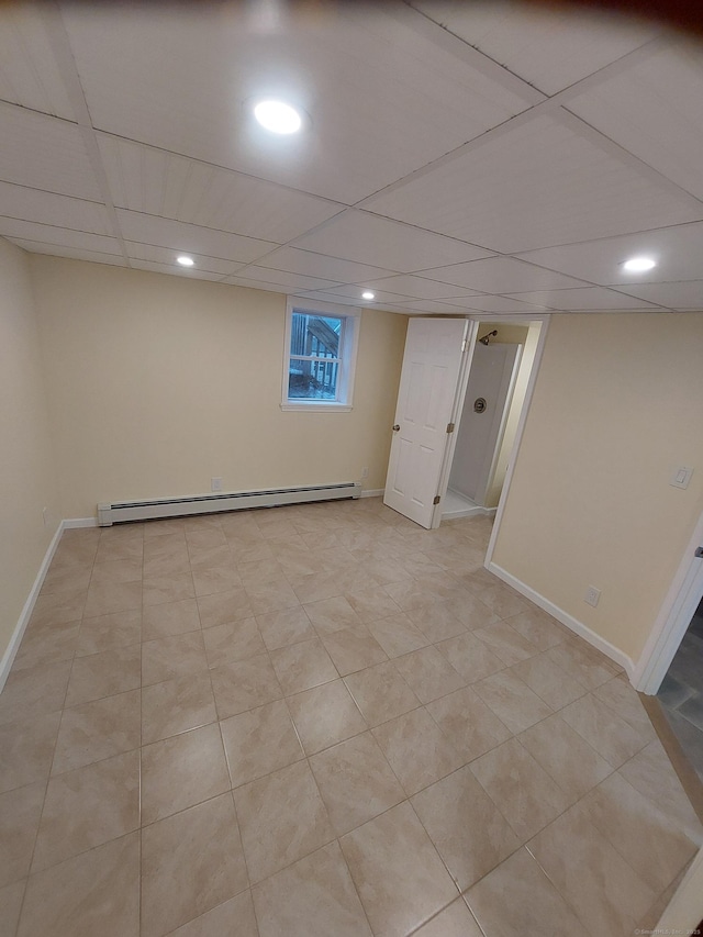 92 Sumac St, West Haven, CT 06516 - finished basement featuring a baseboard radiator and recessed lighting