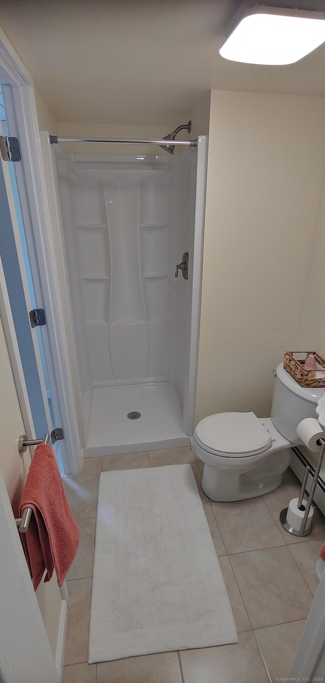 92 Sumac St, West Haven, CT 06516 - bathroom featuring tile patterned flooring, a shower stall, and a baseboard heating unit