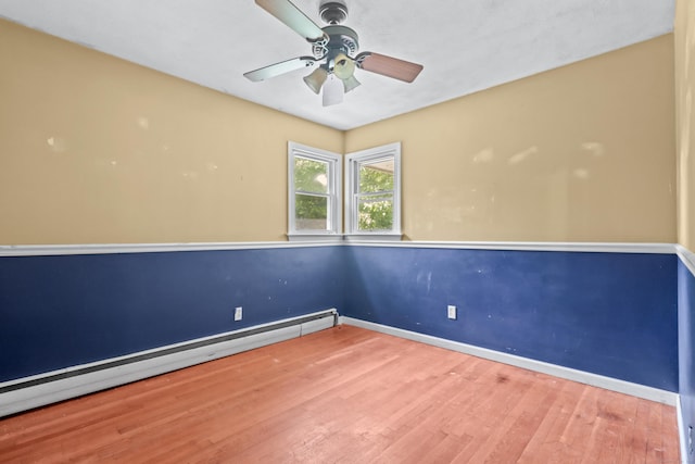 31 Richard Rd, Ledyard, CT 06335 - spare room with a baseboard heating unit, wood finished floors, and a ceiling fan