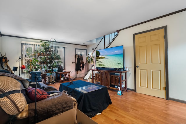 484 First Ave Unit 12, West Haven, CT 06516 - living area featuring crown molding and light wood finished floors