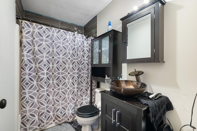 484 First Ave Unit 12, West Haven, CT 06516 - full bathroom with vanity, curtained shower, and a textured ceiling