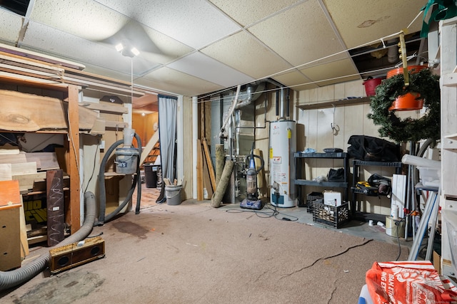 484 First Ave Unit 12, West Haven, CT 06516 - unfinished below grade area with water heater and a paneled ceiling