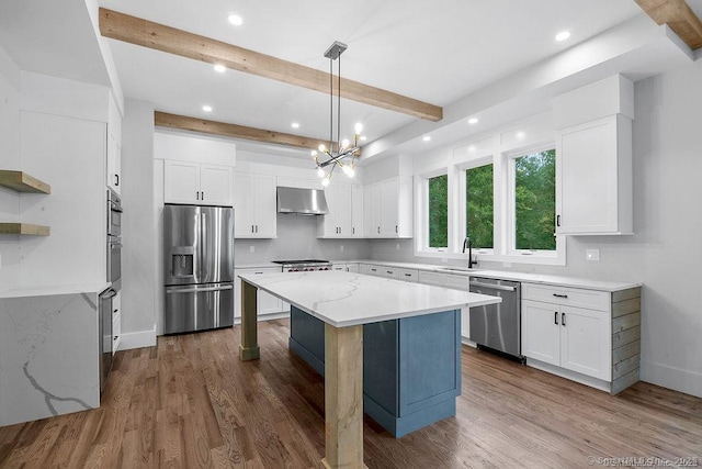 4B Vona Way, Newtown, CT 06470 - kitchen with stainless steel appliances, ventilation hood, beamed ceiling, recessed lighting, and a center island