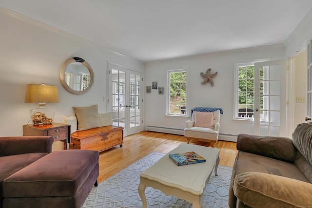 344 Oxbow Rd, Haddam, CT 06422 - living area featuring french doors, a baseboard heating unit, ornamental molding, and wood finished floors