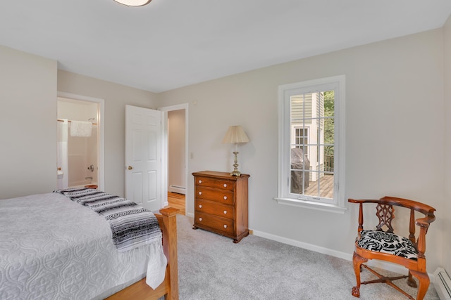 344 Oxbow Rd, Haddam, CT 06422 - bedroom with a baseboard radiator, light carpet, and ensuite bathroom