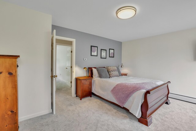 344 Oxbow Rd, Haddam, CT 06422 - bedroom with light carpet and baseboard heating