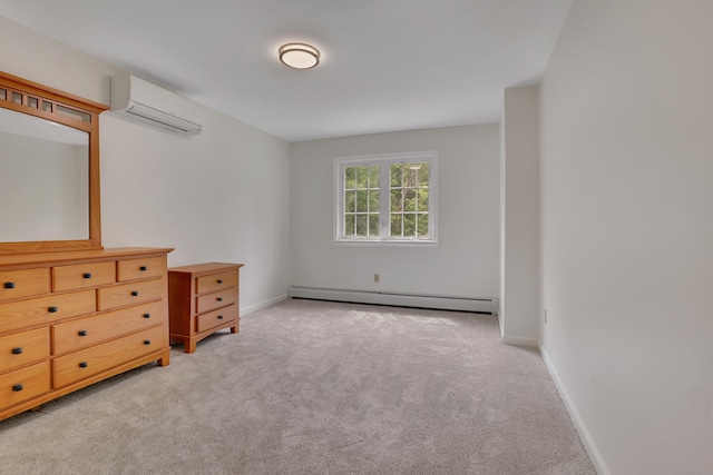 344 Oxbow Rd, Haddam, CT 06422 - bedroom with a wall mounted AC, baseboard heating, and light colored carpet