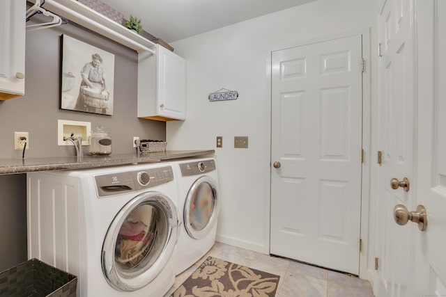 344 Oxbow Rd, Haddam, CT 06422 - laundry area with cabinet space, washing machine and clothes dryer, and light tile patterned flooring